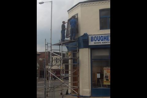 Two men on scaffold